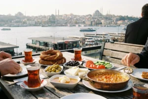 Turkish breakfast spread with tea glasses on an Istanbul terrace