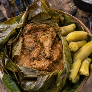 Luwombo stew served in banana leaves