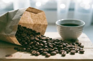 Roasted coffee beans in a kraft bag